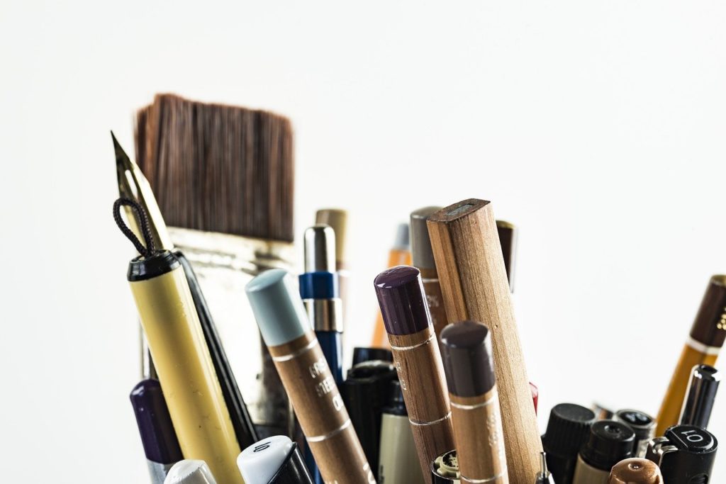 pens, brushes, art materials